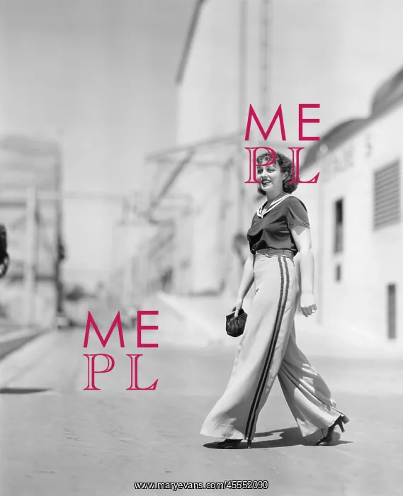 : Young woman walking across the road : Young woman walking across the road
