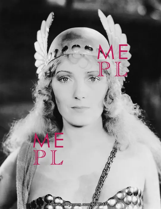 : Young woman wears her cap with wings : Young woman wears her cap with wings