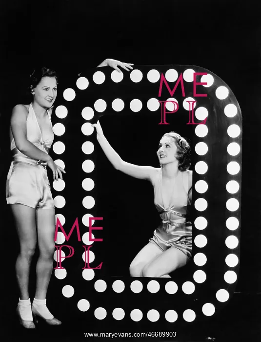 : Two young women posing with the letter O : Two young women posing with the letter O