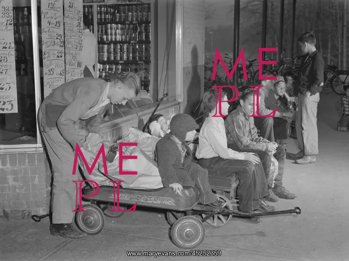 : Youngsters hiring out their express wagons to : Youngsters hiring out their express wagons to