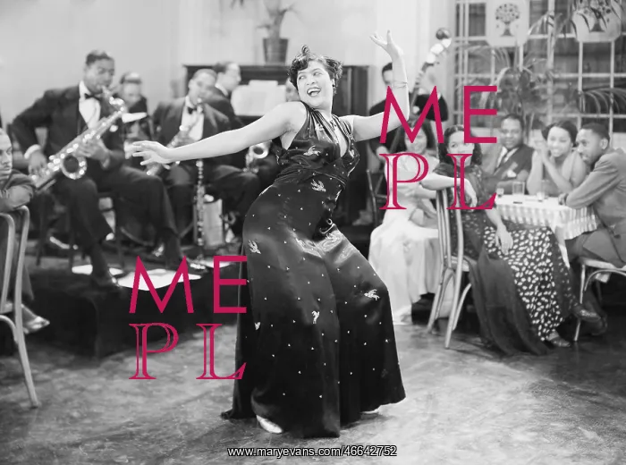 : Zaftig woman performing a dance in front of a group : Zaftig woman performing a dance in front of a group