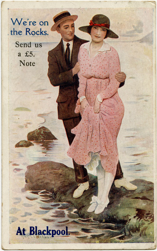 A couple stranded on a rock at Blackpool: 'We're on the rocks. Send us a five pound note.' Date: 1922