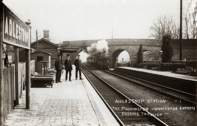 The railway station at Adlestrop, Gloucestershire. Station staff stand on the platform while the Paddington-Worcester Express steams towards the station. The location was immortalised by Edward Thomas in his poem 'Adlestrop'.
early 20th century