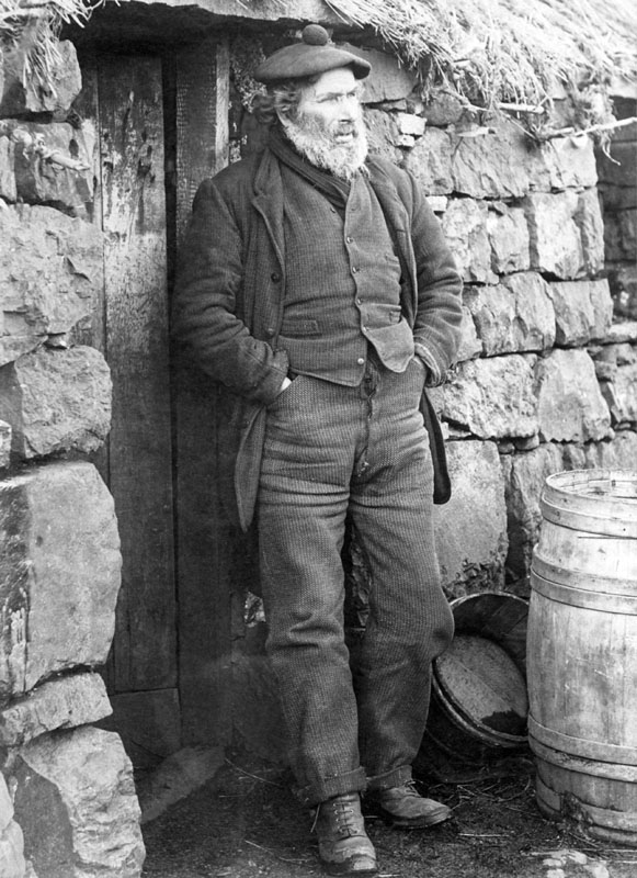 Octogenarian Skye crofter outside his cottage, Scotland. Date: late 19th century