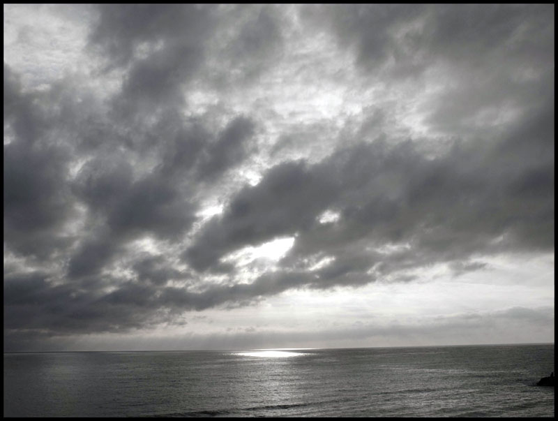 Sun through clouds over the sea, Italy.
20th century