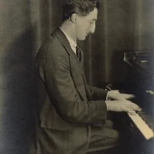 A. P. Herbert playing the piano