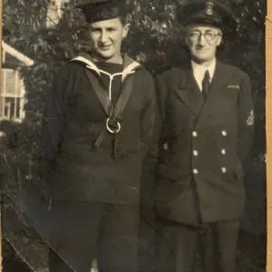 A. P. Herbert with young lad (son?) in Naval attire