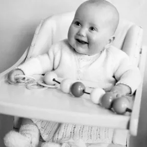 BABY IN A HIGH CHAIR BABY IN A HIGH CHAIR
