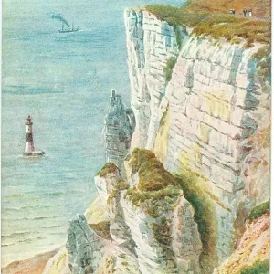 Beachy Head view down the cliffs to the sea and lighthouse Beachy Head view down the cliffs to the sea and lighthouse