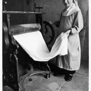 Benedictine nun doing the laundry, Talacre Abbey Benedictine nun doing the laundry, Talacre Abbey