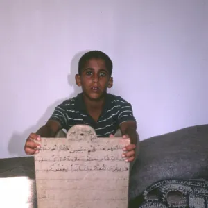 Boy learning Koran at Sirte, Libya Boy learning Koran at Sirte, Libya