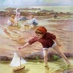 Boy and sailboat by the seaside Boy and sailboat by the seaside