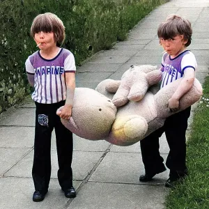 Two boys with teddy bears, Redruth, Cornwall Two boys with teddy bears, Redruth, Cornwall
