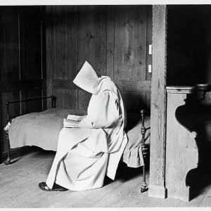 Carthusian monk reading in his cell Carthusian monk reading in his cell