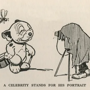 A celebrity stands for a portrait A celebrity stands for a portrait