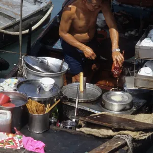 Chef prepares a Peking Duck - floating restaurant, Hong Kong Chef prepares a Peking Duck - floating restaurant, Hong Kong