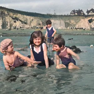 Four children at the seaside Four children at the seaside