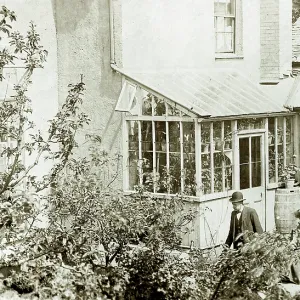 Couple enjoying the sunshine in their back garden