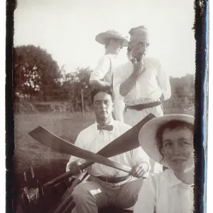 Two couples on an outing in a boat Two couples on an outing in a boat