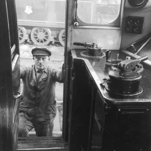 A Driver Climbing in to his Cab A Driver Climbing in to his Cab
