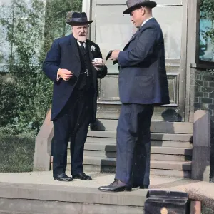 Two Edwardian men on terrace