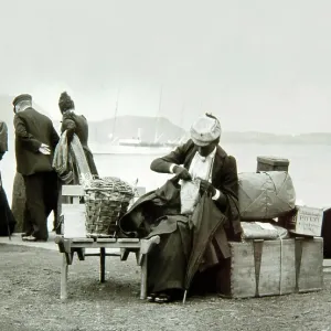 Edwardian passengers waiting to board a boat Edwardian passengers waiting to board a boat