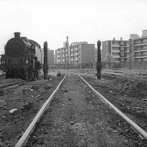 Nine Elms Loco Yard with steam engine and flats beyond Nine Elms Loco Yard with steam engine and flats beyond
