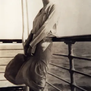 Glamorous lady on the deck of the deck of an ocean liner Glamorous lady on the deck of the deck of an ocean liner