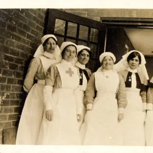 Group of Nurses and Nuns in front of door Group of Nurses and Nuns in front of door