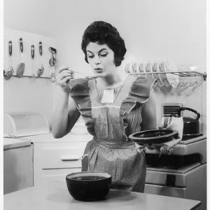 Housewife in the kitchen, c.1960 Housewife in the kitchen, c.1960