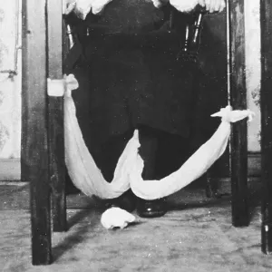 Kathleen Goligher with ectoplasmic loop, Belfast Kathleen Goligher with ectoplasmic loop, Belfast