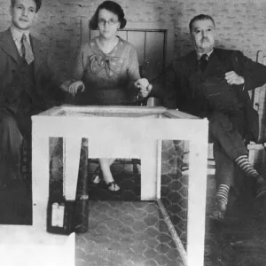 Kathleen Goligher with two men at a sitting Kathleen Goligher with two men at a sitting