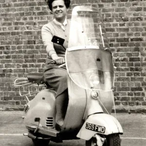Lady on 1950s scooter Lady on 1950s scooter