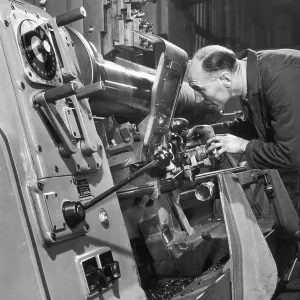 A lathe operator at work A lathe operator at work