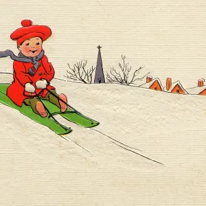 Little boy out sledging