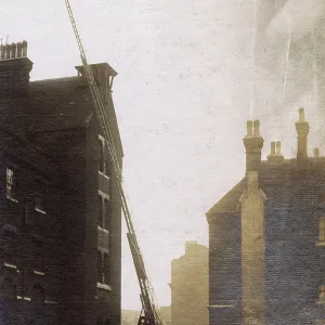 London Fire Brigade operating extended ladder London Fire Brigade operating extended ladder