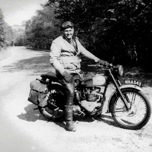 Man & 1948 Triumph motorcycle Man & 1948 Triumph motorcycle