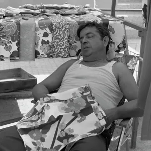 Man asleep with patterned material Man asleep with patterned material