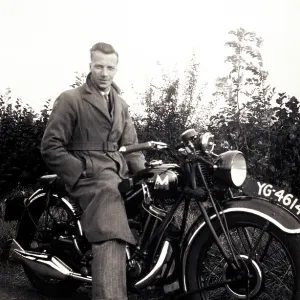 Man sitting on his 1934 Matchless motorcycle Man sitting on his 1934 Matchless motorcycle
