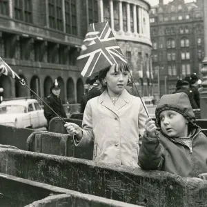 Manchester - Two young Children waving Union Flags Manchester - Two young Children waving Union Flags
