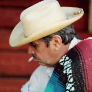 Mexican man with cigarette and hat Mexican man with cigarette and hat