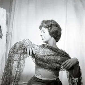 Model with a lacy shawl Model with a lacy shawl