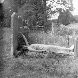 Model posing in a graveyard Model posing in a graveyard