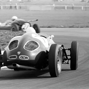 Moss in Porsche, Aintree, England Moss in Porsche, Aintree, England