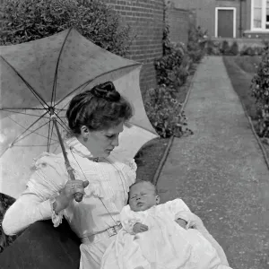 Mother and baby in a garden Mother and baby in a garden