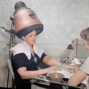 New York, New York. Getting a manicure while drying hair at New York, New York. Getting a manicure while drying hair at