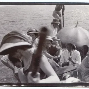 People on an outing in a punt, Middle East People on an outing in a punt, Middle East