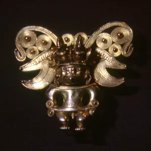 Pre-Columbian gold object in human shape Pre-Columbian gold object in human shape