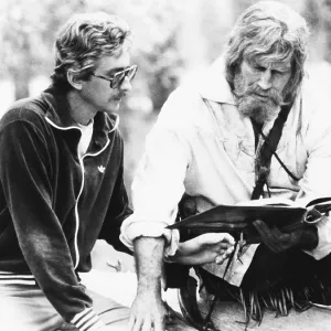Screenwriter Fraser Clark Heston (left) discusses Screenwriter Fraser Clark Heston (left) discusses