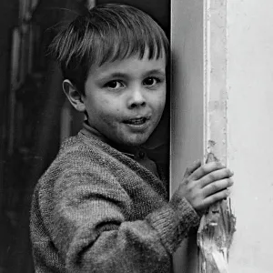 Shepherds Bush London, boy on demolition site Shepherds Bush London, boy on demolition site